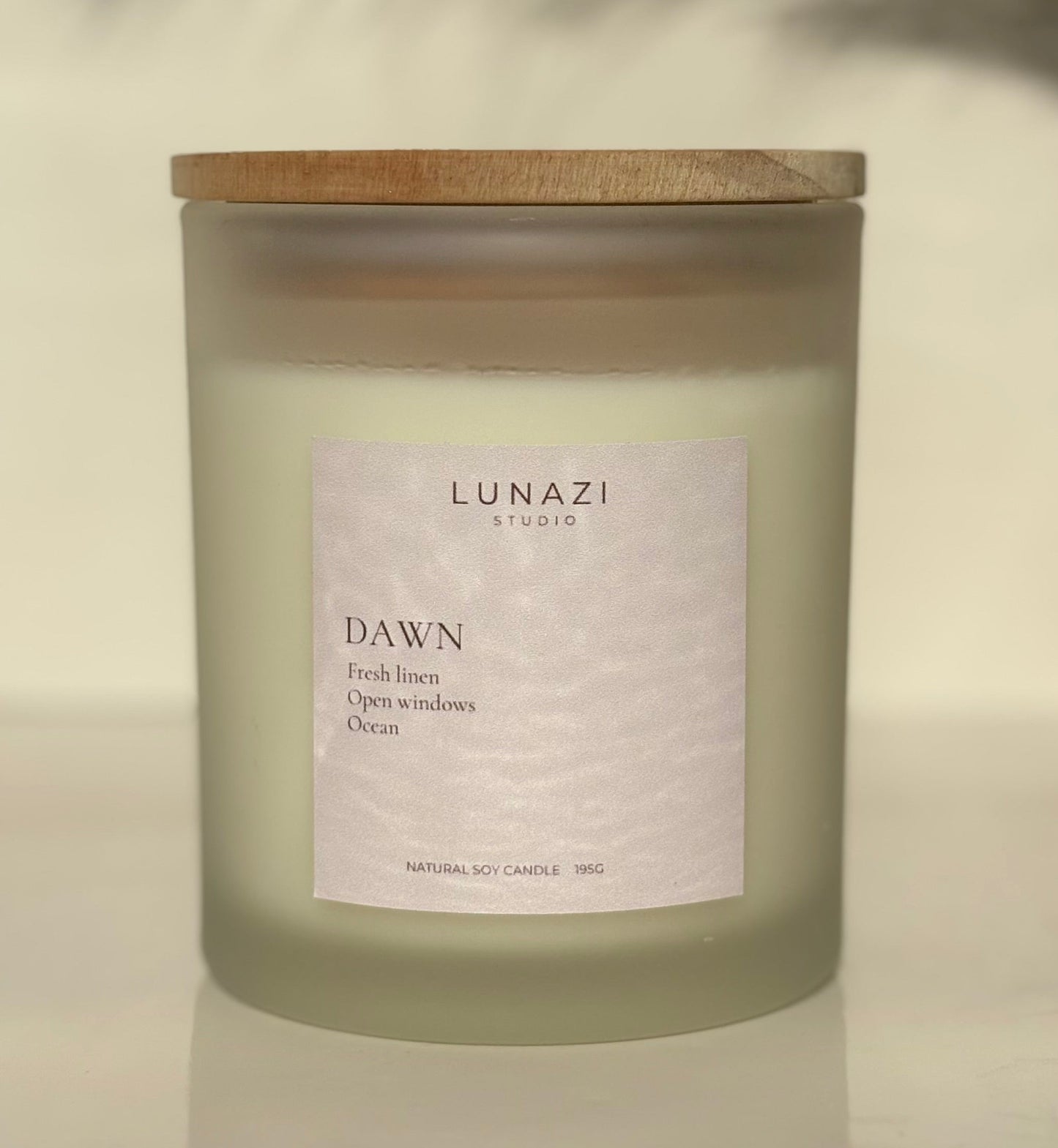 Dawn Scented Candle by Lunazi Studio – hand-poured soy wax candle in frosted glass jar on neutral background
