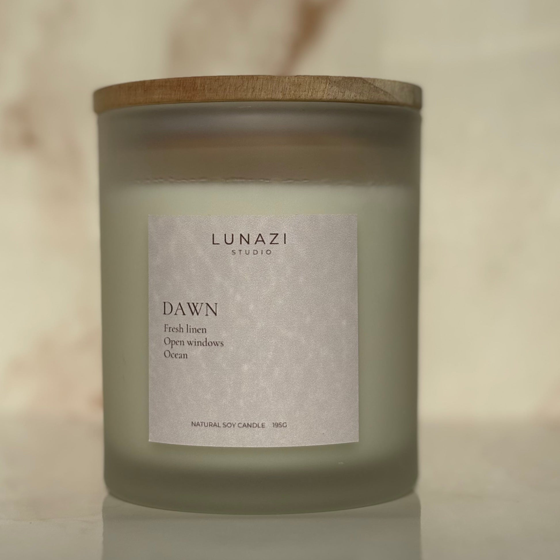 Dawn Scented Candle by Lunazi Studio – hand-poured soy wax candle in frosted glass jar on neutral background